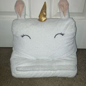 Unicorn pillow, great for holding laptop or notebook. Like new